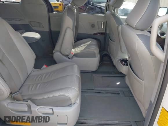 2012 Toyota Sienna XLE with VIN 5TDDK3DC3CS041984, listed as a IAAI auction lot 41711974 with 149,879 mi miles and . Bid and sale history available at DreamBid. Image 8.