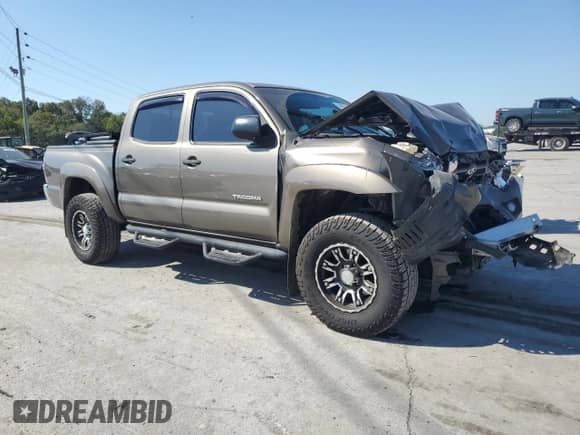 2014 Toyota Tacoma PreRunner z VIN 5TFJU4GN3EX052089, wystawiony jako Copart lot #85092355 z przebiegiem 106 271 mil mil oraz Szkoda całkowita • Salvage title. Historia ofert i sprzedaży dostępna na DreamBid. Obrazek 4.