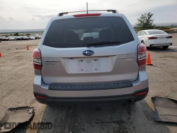 2014 Subaru Forester Premium with VIN JF2SJACC5EG479663, listed as a Copart auction lot 65037125 with 111,831 mi miles and Clean title. Bid and sale history available at DreamBid. Image 7.