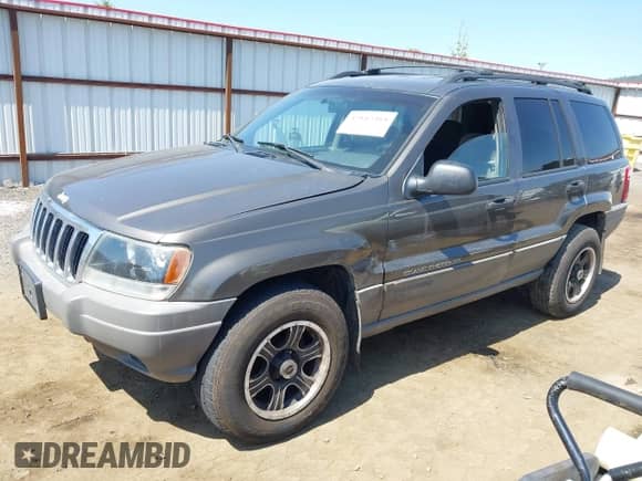 1999 Jeep Grand Cherokee Laredo с VIN 1J4G258S7XC656551, выставлен на аукционе IAAI как лот 42182464 с пробегом 230 709 миль миль и . История ставок и продаж доступна на DreamBid. Изображение 2.