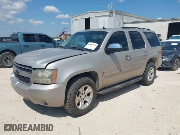 2007 Chevrolet Tahoe LS with VIN 1GNFC13C97R323828, listed as a IAAI auction lot 42863719 with 290,710 mi miles and . Bid and sale history available at DreamBid. Image 2.