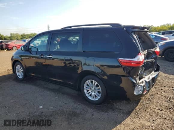 2015 Toyota Sienna XLE с VIN 5TDYK3DC0FS568760, выставлен на аукционе Copart как лот 71931115 с пробегом 129 066 миль миль и Списание • Salvage title. История ставок и продаж доступна на DreamBid. Изображение 2.