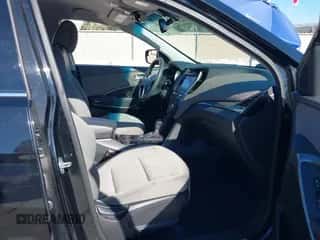 2018 Hyundai Santa Fe 2.4L z VIN 5NMZU3LB1JH098578, wystawiony jako IAAI lot #43506378 z przebiegiem 126 318 mil mil oraz . Historia ofert i sprzedaży dostępna na DreamBid. Obrazek 5.