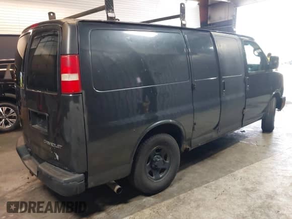 2004 Chevrolet Express Cargo with VIN 1GCFG15X241176422, listed as a IAAI auction lot 42227499 with 270,000 mi miles and . Bid and sale history available at DreamBid. Image 4.