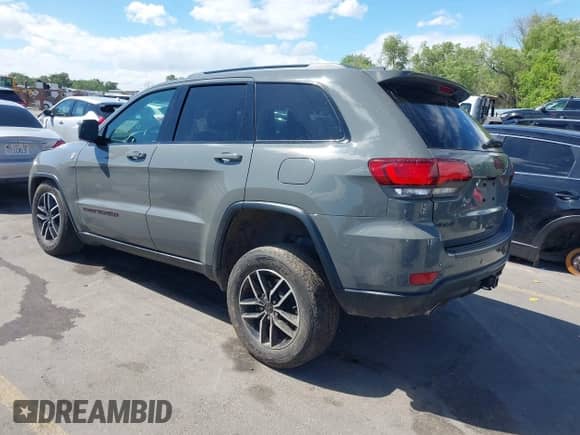 2020 Jeep Grand Cherokee Trailhawk with VIN 1C4RJFLG7LC384524, listed as a IAAI auction lot 42312713 with 50,221 mi miles and . Bid and sale history available at DreamBid. Image 3.