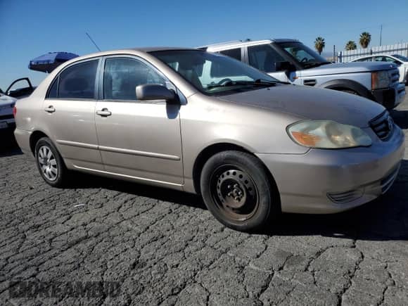 2004 Toyota Corolla CE z VIN 1NXBR32E94Z301126, wystawiony jako Copart lot #87467835 z przebiegiem 181 189 mil mil oraz Szkoda całkowita • Salvage title. Historia ofert i sprzedaży dostępna na DreamBid. Obrazek 4.