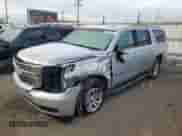 2018 Chevrolet Suburban LT z VIN 1GNSCHKCXJR332103, wystawiony jako Copart lot #82861393 z przebiegiem 143 607 mil mil oraz . Historia ofert i sprzedaży dostępna na DreamBid. Obrazek 1.
