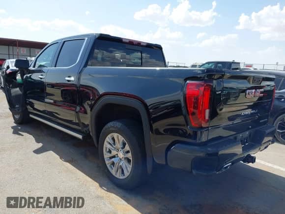 2023 GMC Sierra 1500 Denali with VIN 1GTUUGEL8PZ166614, listed as a IAAI auction lot 42560659 with 32,124 mi miles and . Bid and sale history available at DreamBid. Image 3.