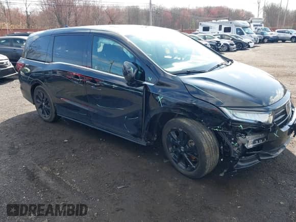 2023 Honda Odyssey Sport z VIN 5FNRL6H79PB075326, wystawiony jako IAAI lot #41911662 z przebiegiem 14 183 mil mil oraz . Historia ofert i sprzedaży dostępna na DreamBid. Obrazek 1.