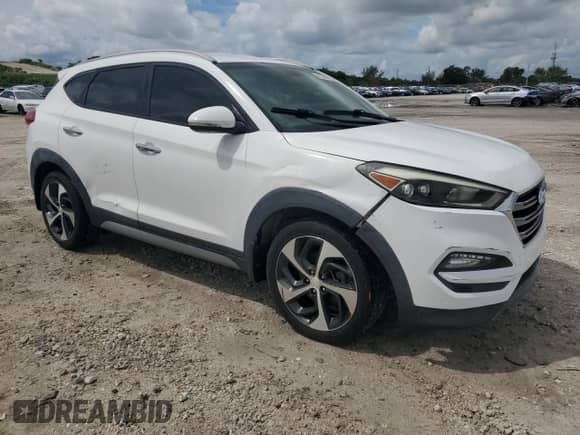 2017 Hyundai Tucson Eco z VIN KM8J33A25HU319651, wystawiony jako Copart lot #81591975 z przebiegiem 104 365 mil mil oraz Czysty tytuł • Clean title. Historia ofert i sprzedaży dostępna na DreamBid. Obrazek 4.