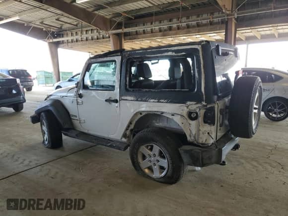 2013 Jeep Wrangler Sport with VIN 1C4AJWAG5DL677940, listed as a Copart auction lot 59140835 with Not provided miles and Non repairable. Bid and sale history available at DreamBid. Image 2.