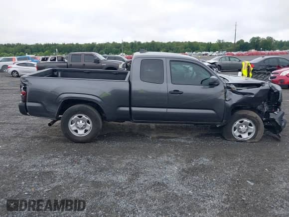 2023 Toyota Tacoma SR with VIN 3TYSX5EN6PT021792, listed as a IAAI auction lot 43037546 with 20,673 mi miles and . Bid and sale history available at DreamBid. Image 13.