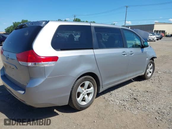 2012 Toyota Sienna with VIN 5TDKA3DC8CS014421, listed as a IAAI auction lot 42796292 with 227,527 mi miles and . Bid and sale history available at DreamBid. Image 4.