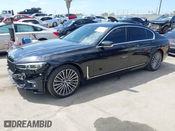 2022 BMW 7 Series 750i xDrive with VIN WBA7U2C00NCK89037, listed as a IAAI auction lot 43061960 with 30,841 mi miles and . Bid and sale history available at DreamBid. Image 23.