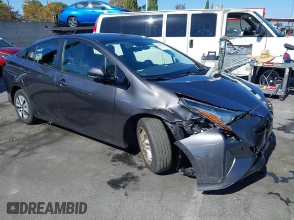 2018 Toyota Prius Two Eco with VIN JTDKARFU4J3552881, listed as a IAAI auction lot 43516332 with 71,276 mi miles and . Bid and sale history available at DreamBid. Image 1.