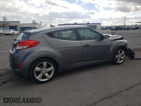 2014 Hyundai Veloster z VIN KMHTC6AD8EU194443, wystawiony jako Copart lot #60059565 z przebiegiem 201 848 mil mil oraz Szkoda całkowita • Salvage title. Historia ofert i sprzedaży dostępna na DreamBid. Obrazek 3.