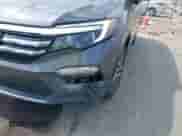 2017 Honda Pilot Touring z VIN 5FNYF6H93HB095058, wystawiony jako IAAI lot #43234712 z przebiegiem 137 267 mil mil oraz . Historia ofert i sprzedaży dostępna na DreamBid. Obrazek 6.