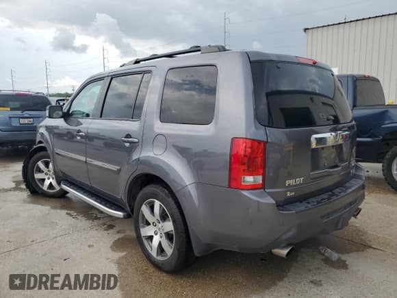 2015 Honda Pilot Touring с VIN 5FNYF3H97FB011917, выставлен на аукционе Copart как лот 54188775 с пробегом Не указан миль и На запчасти • Non repairable. История ставок и продаж доступна на DreamBid. Изображение 2.