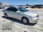 2006 Toyota Camry LE с VIN 4T1BE32K46U145551, выставлен на аукционе Copart как лот 70001745 с пробегом 198 337 миль миль и Списание • Salvage title. История ставок и продаж доступна на DreamBid. Изображение 4.