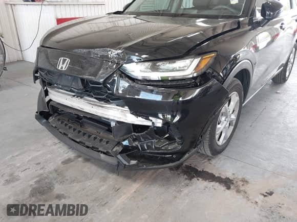 2025 Honda HR-V LX с VIN 3CZRZ1H30SM737050, выставлен на аукционе IAAI как лот 43313443 с пробегом 9 718 миль миль и . История ставок и продаж доступна на DreamBid. Изображение 6.