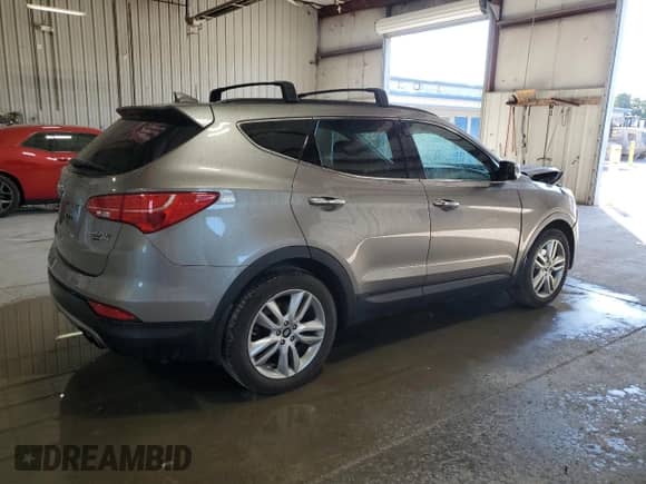 2016 Hyundai Santa Fe z VIN 5XYZWDLA6GG310353, wystawiony jako Copart lot #70031925 z przebiegiem 42 324 mil mil oraz Szkoda całkowita • Salvage title. Historia ofert i sprzedaży dostępna na DreamBid. Obrazek 3.