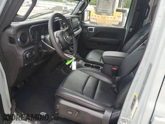 2024 Jeep Wrangler Rubicon with VIN 1C4RJXR66RW100859, listed as a Copart auction lot 58377805 with 9,426 mi miles and Salvage title. Bid and sale history available at DreamBid. Image 7.