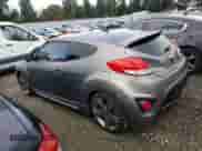 2015 Hyundai Veloster Turbo z VIN KMHTC6AEXFU237769, wystawiony jako Copart lot #84004975 z przebiegiem 98 923 mil mil oraz Czysty tytuł • Clean title. Historia ofert i sprzedaży dostępna na DreamBid. Obrazek 2.