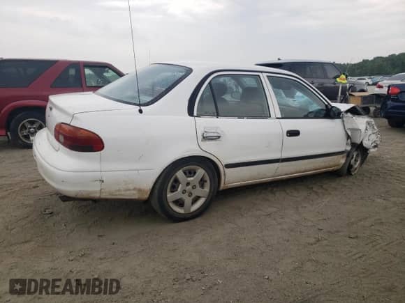2000 Chevrolet Prizm с VIN 1Y1SK5281YZ415530, выставлен на аукционе Copart как лот 60704824 с пробегом Не указан миль и Списание • Salvage title. История ставок и продаж доступна на DreamBid. Изображение 3.