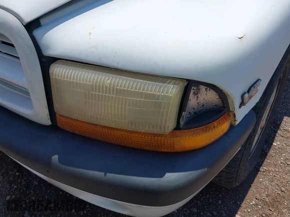 2000 Dodge Dakota Sport with VIN 1B7GL2AX1YS707993, listed as a IAAI auction lot 42670217 with 172,037 mi miles and . Bid and sale history available at DreamBid. Image 13.