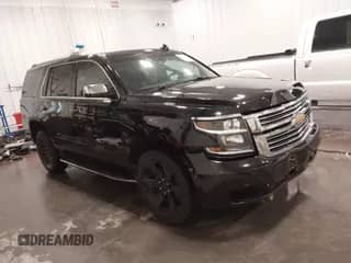 2017 Chevrolet Tahoe Premier with VIN 1GNSKCKC8HR156040, listed as a IAAI auction lot 42253603 with 103,869 mi miles and . Bid and sale history available at DreamBid. Image 1.