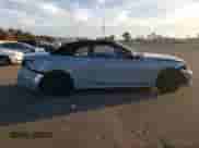 2023 BMW 4 Series 430i xDrive with VIN WBA43AT0XPCL59517, listed as a Copart auction lot 72859063 with 8,653 mi miles and Salvage title. Bid and sale history available at DreamBid. Image 4.