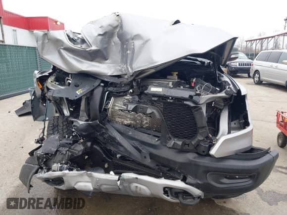 2020 Ram 1500 Rebel with VIN 1C6SRFET1LN114950, listed as a IAAI auction lot 41768869 with 105,583 mi miles and . Bid and sale history available at DreamBid. Image 6.