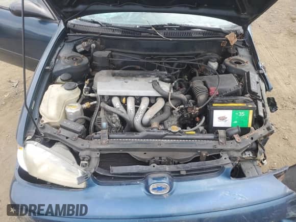 1999 Chevrolet Prizm z VIN 1Y1SK5281XZ414148, wystawiony jako Copart lot #71731384 z przebiegiem 224 527 mil mil oraz Szkoda całkowita • Salvage title. Historia ofert i sprzedaży dostępna na DreamBid. Obrazek 11.