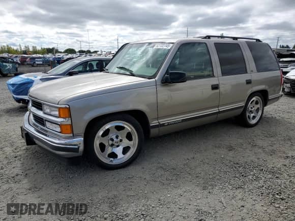 1999 Chevrolet Tahoe with VIN 1GNEC13R0XJ546712, listed as a Copart auction lot 62722745 with 108,864 mi miles and Salvage title. Bid and sale history available at DreamBid. Image 1.