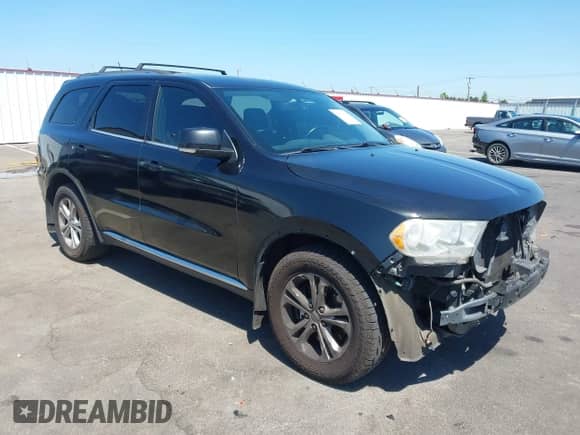 2012 Dodge Durango Crew with VIN 1C4SDJDT8CC205088, listed as a IAAI auction lot 42736638 with 189,387 mi miles and . Bid and sale history available at DreamBid. Image 1.