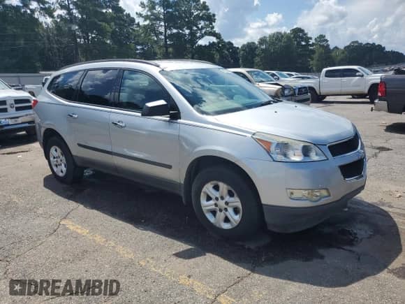 2012 Chevrolet Traverse LS with VIN 1GNKRFED3CJ190203, listed as a Copart auction lot 69183445 with 120,282 mi miles and Salvage title. Bid and sale history available at DreamBid. Image 4.