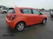2012 Chevrolet Sonic LT с VIN 1G1JC6SH1C4118243, выставлен на аукционе Copart как лот 86849215 с пробегом 77 629 миль миль и Списание • Salvage title. История ставок и продаж доступна на DreamBid. Изображение 3.