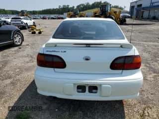 1998 Chevrolet Malibu LS z VIN 1G1NE52M8WY158738, wystawiony jako Copart lot #65030854 z przebiegiem 84 739 mil mil oraz Nie do naprawy • Non repairable. Historia ofert i sprzedaży dostępna na DreamBid. Obrazek 6.