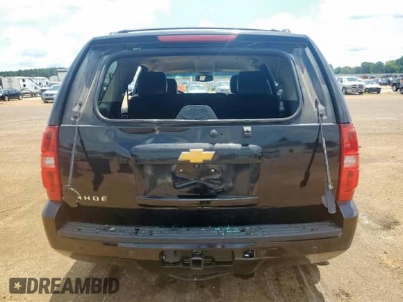 2014 Chevrolet Tahoe LT with VIN 1GNSCBE0XER118569, listed as a Copart auction lot 64116525 with 162,561 mi miles and Salvage title. Bid and sale history available at DreamBid. Image 6.