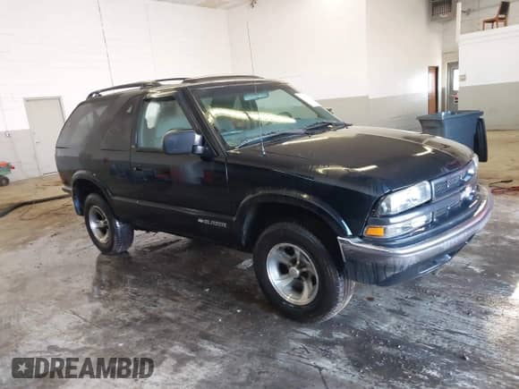 2001 Chevrolet Blazer LS with VIN 1GNCS18W51K260297, listed as a IAAI auction lot 41697909 with 144,564 mi miles and . Bid and sale history available at DreamBid. Image 1.