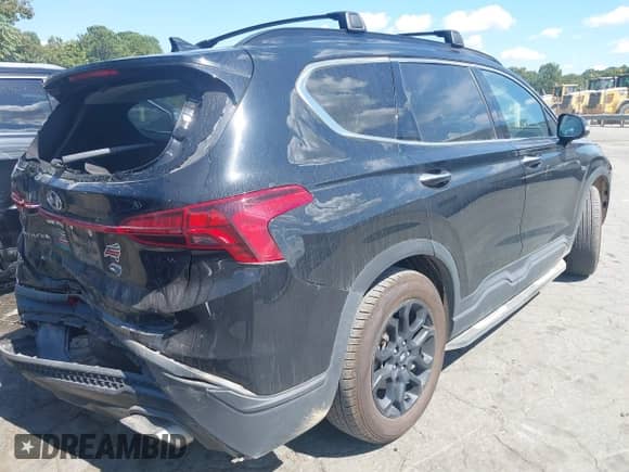 2023 Hyundai Santa Fe XRT with VIN 5NMS64AJ4PH490636, listed as a IAAI auction lot 43136441 with 82,841 mi miles and . Bid and sale history available at DreamBid. Image 4.