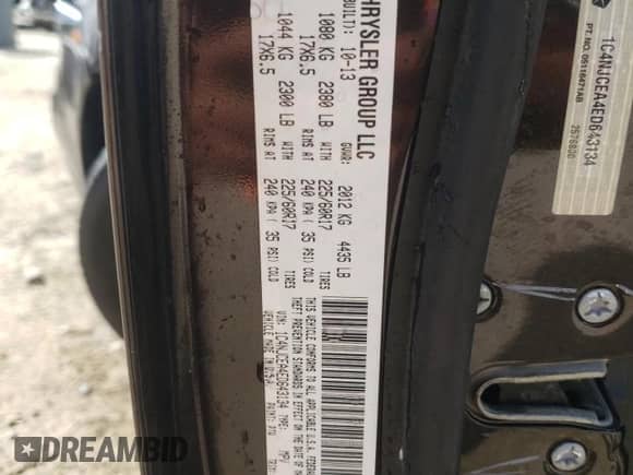 2014 Jeep Compass Latitude with VIN 1C4NJCEA4ED643134, listed as a Copart auction lot 71044335 with 103,025 mi miles and Salvage title. Bid and sale history available at DreamBid. Image 13.