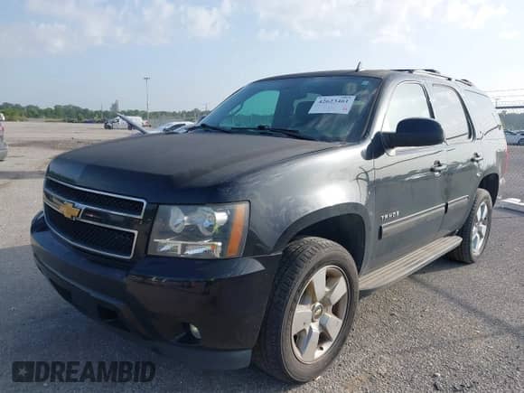 2014 Chevrolet Tahoe LT with VIN 1GNSCBE07ER120098, listed as a IAAI auction lot 42623461 with 166,170 mi miles and . Bid and sale history available at DreamBid. Image 2.