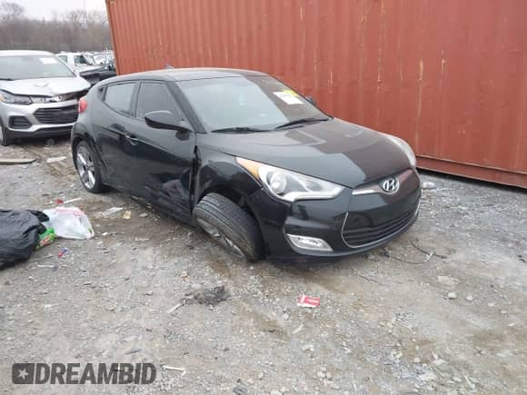 2014 Hyundai Veloster with VIN KMHTC6AD6EU182596, listed as a IAAI auction lot 41498382 with 99,376 mi miles and . Bid and sale history available at DreamBid. Image 1.