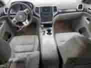 2012 Jeep Grand Cherokee Laredo с VIN 1C4RJEATXCC317054, выставлен на аукционе Copart как лот 63057615 с пробегом 159 633 миль миль и Списание • Salvage title. История ставок и продаж доступна на DreamBid. Изображение 8.