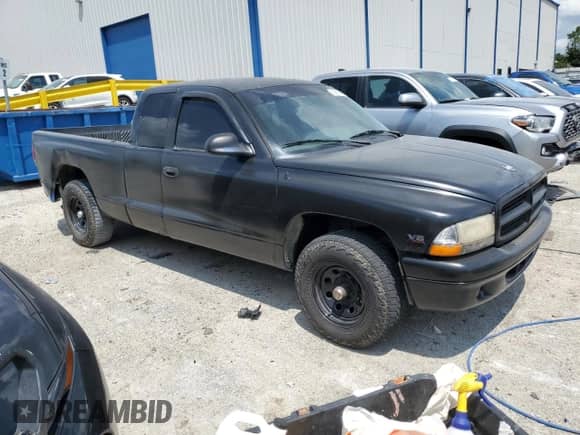 1999 Dodge Dakota SLT with VIN 1B7GL22XXXS135433, listed as a Copart auction lot 65697955 with 212,792 mi miles and Non repairable. Bid and sale history available at DreamBid. Image 4.