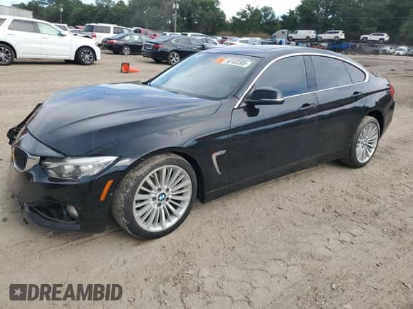 2015 BMW 4 Series 428i xDrive z VIN WBA4A7C54FD413570, wystawiony jako Copart lot #62432505 z przebiegiem 98 017 mil mil oraz Szkoda całkowita • Salvage title. Historia ofert i sprzedaży dostępna na DreamBid. Obrazek 1.