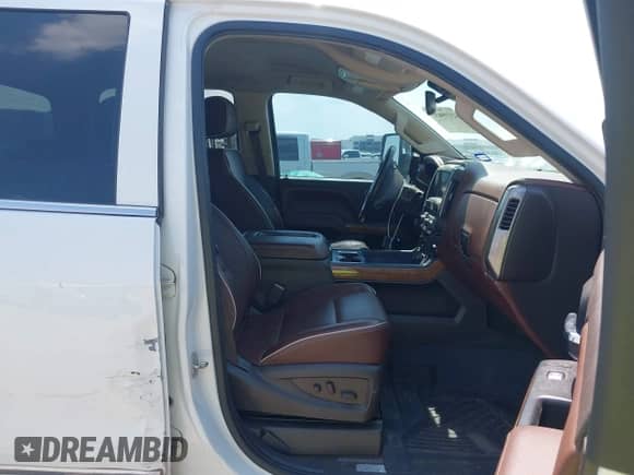 2015 Chevrolet Silverado 2500HD High Country z VIN 1GC1KXE8XFF592342, wystawiony jako IAAI lot #43199637 z przebiegiem 239 985 mil mil oraz . Historia ofert i sprzedaży dostępna na DreamBid. Obrazek 5.