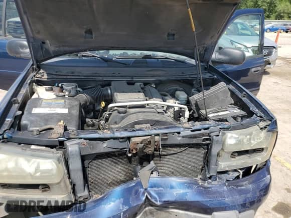 2003 Chevrolet TrailBlazer EXT LT z VIN 1GNET16S936187498, wystawiony jako Copart lot #69054275 z przebiegiem 188 046 mil mil oraz Szkoda całkowita • Salvage title. Historia ofert i sprzedaży dostępna na DreamBid. Obrazek 11.