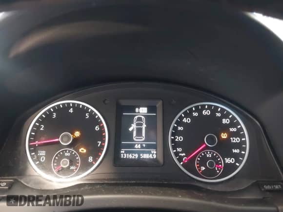 2013 Volkswagen Tiguan with VIN WVGCV3AX7DW605594, listed as a IAAI auction lot 42057457 with 131,629 mi miles and . Bid and sale history available at DreamBid. Image 7.